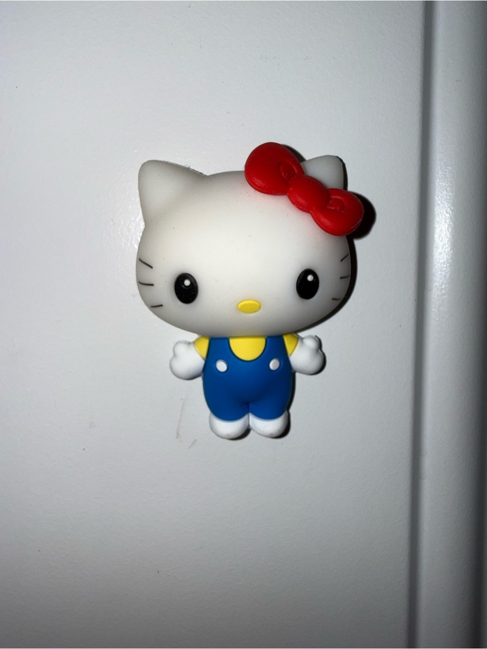 Hello Kitty magnet with red bow and blue overalls #hellokitty #kawaii